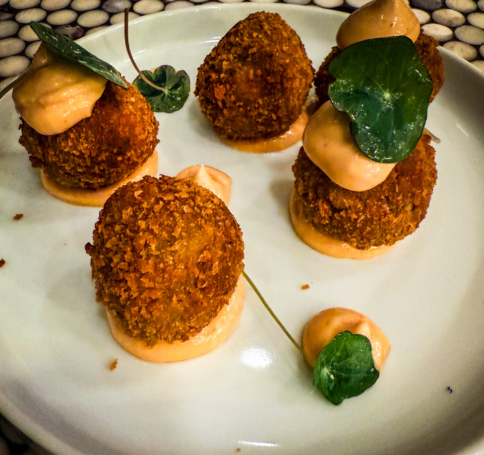 Olive all' Ascolana – Deep-fried stuffed olives filled with savory beef, served golden and crispy as a classic Italian appetizer.